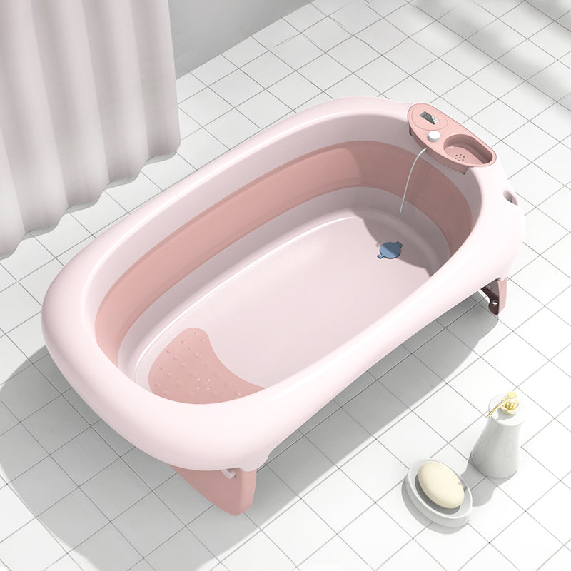 Foldable Portable Pink Bath Tub for Newborn, Baby & Kids With Thermometer For Girls in a bathroom